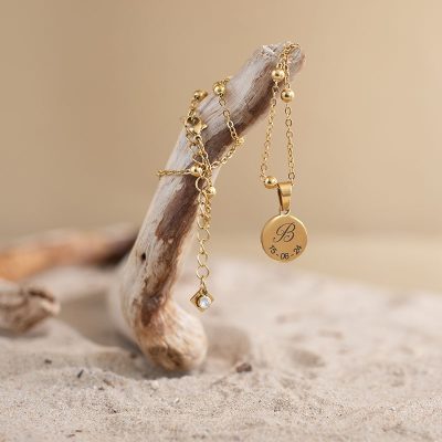 Ketting met letter en datum